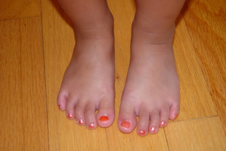 Kasen with her pretty orange crush toe nails